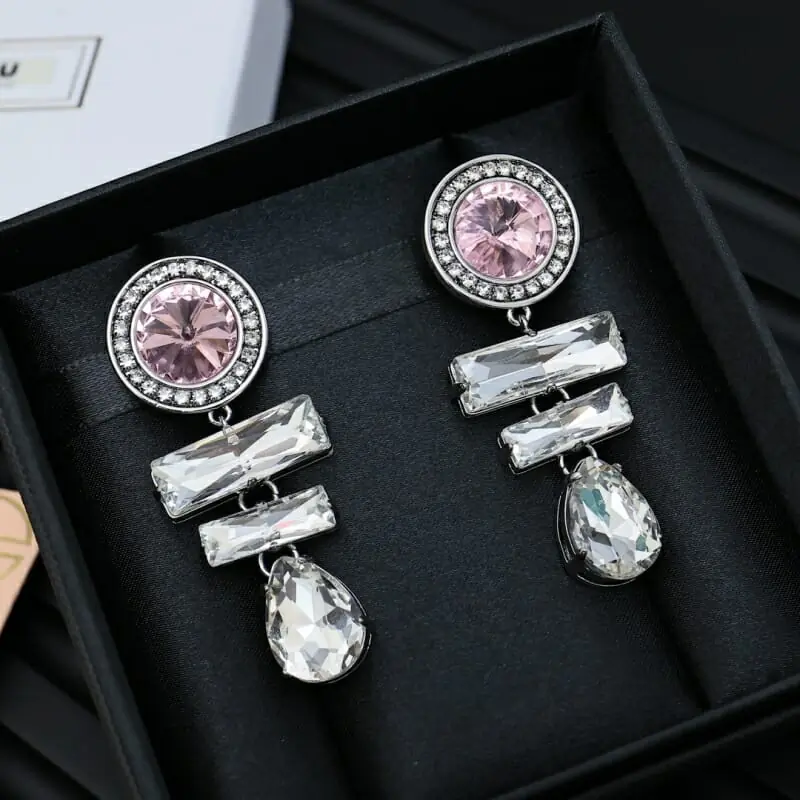 miu miu boucles doreilles pour femme s_123a20a